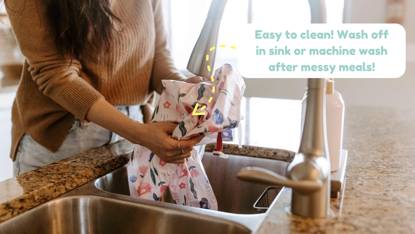 Hands washing a 'Little Birdie' print Bibvy bib in the sink, with a caption highlighting the ease of cleaning by rinsing or machine washing after meals.